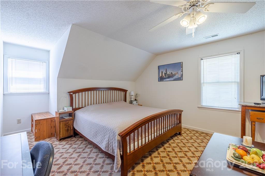 115 Banksridge Road Fort Mill, SC 29715 - Photo 28 of 29 a bedroom with bed and a window