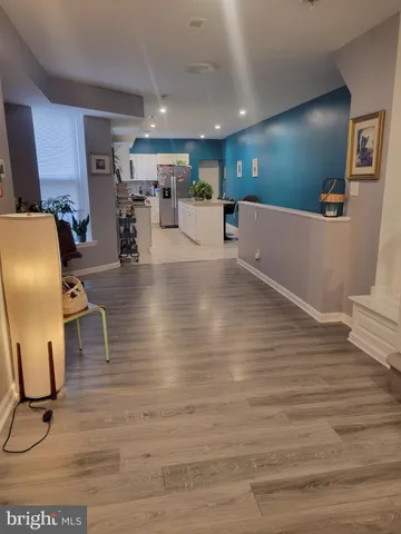 a view of a living room and dining room