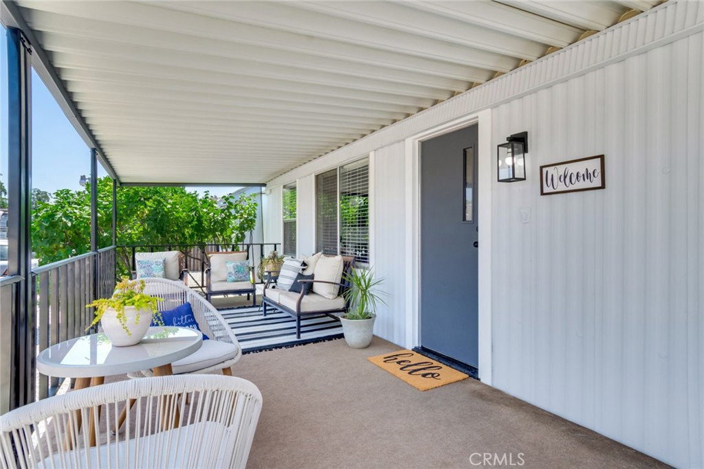 975 California Street, Unit 72 Calimesa, CA 92320 - Photo 5 of 23 a outdoor living space with furniture and garden view
