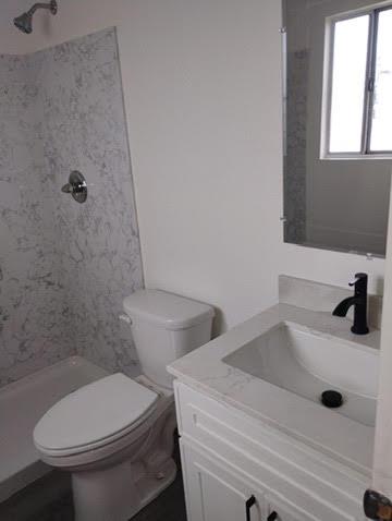 2540 Jordan Court Stockton, CA 95205 - Photo 5 of 5 a bathroom with a sink and a toilet