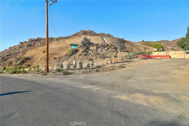 a view of a house with a snow in the background