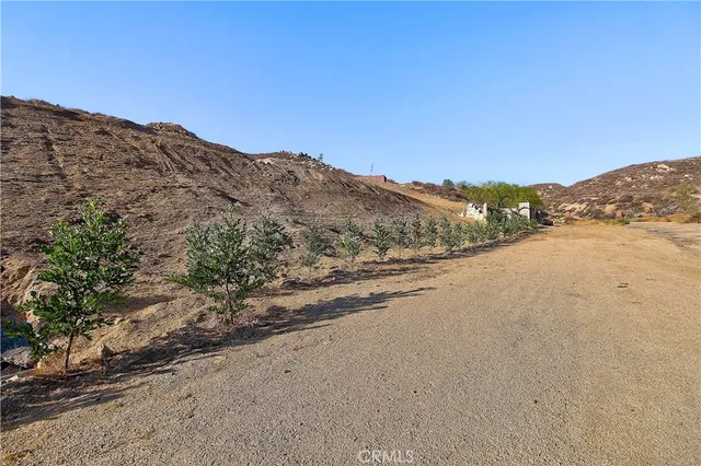 a view of a beach with a ocean view