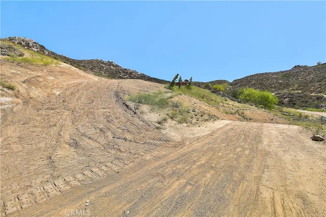 a view of mountain view with mountains in the background