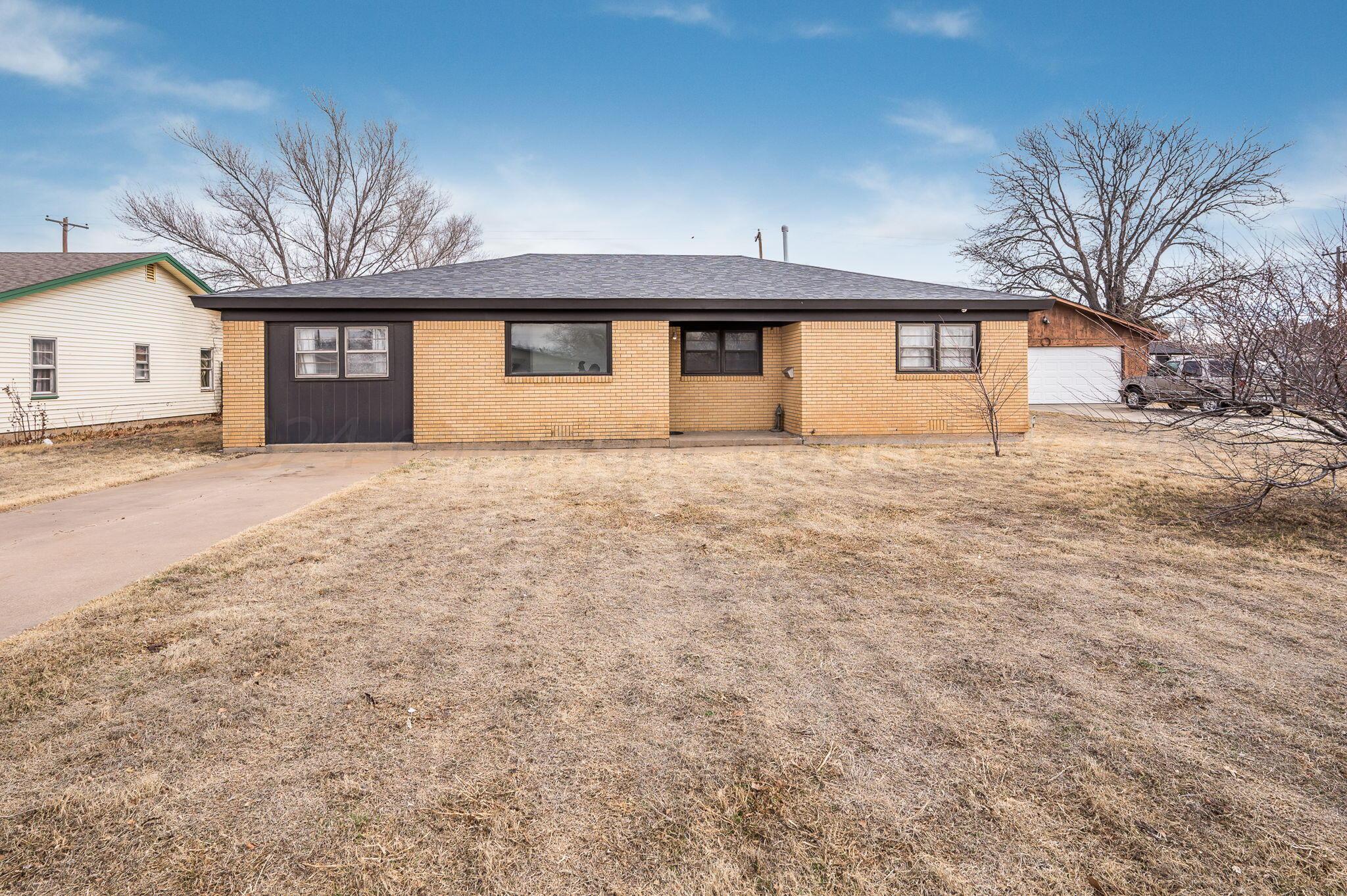 4205 South Bonham Street Amarillo, TX 79110 - Photo 1 of 24 a front view of house with yard