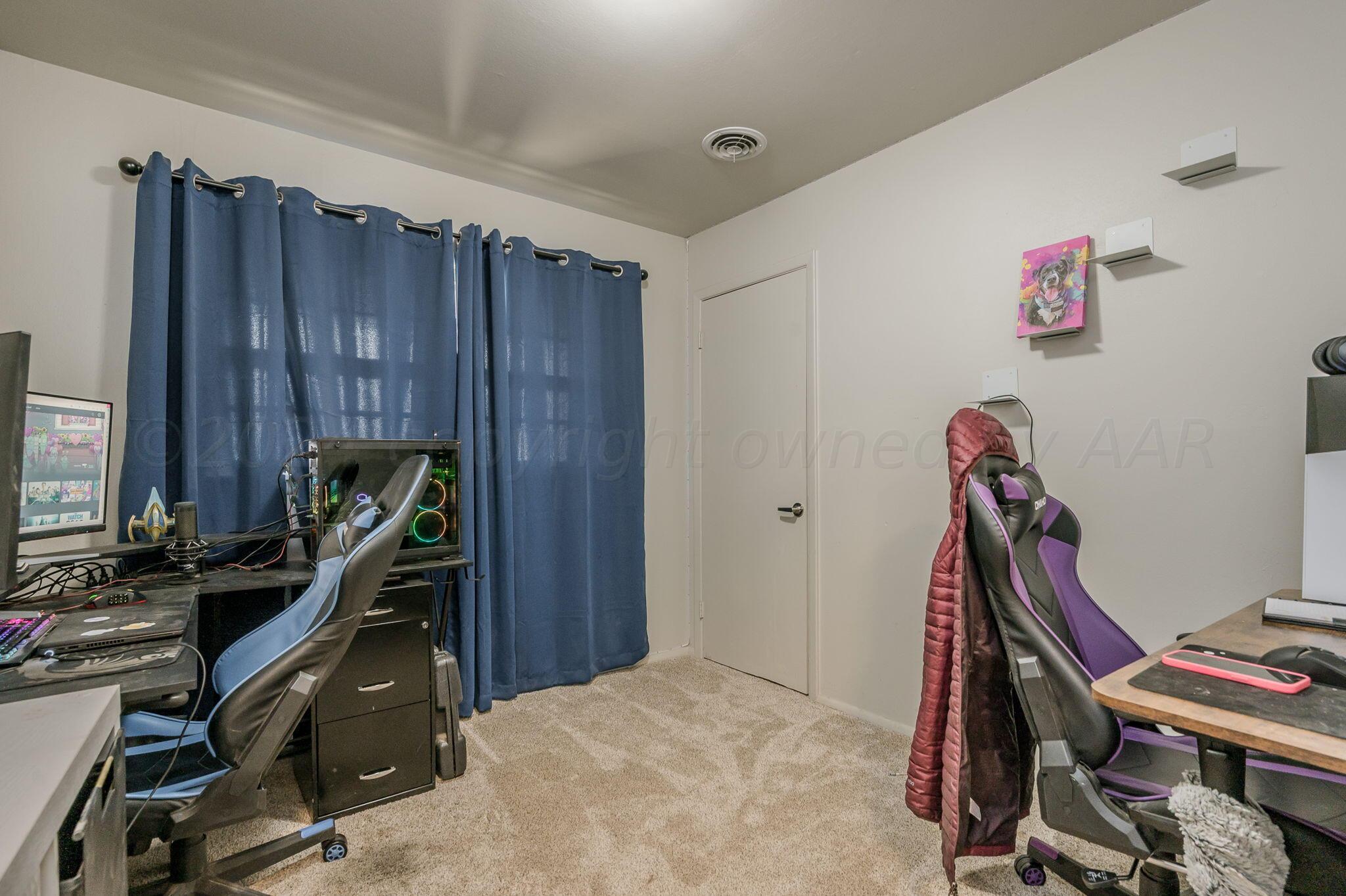 4205 South Bonham Street Amarillo, TX 79110 - Photo 16 of 24 a view of a room with gym equipment