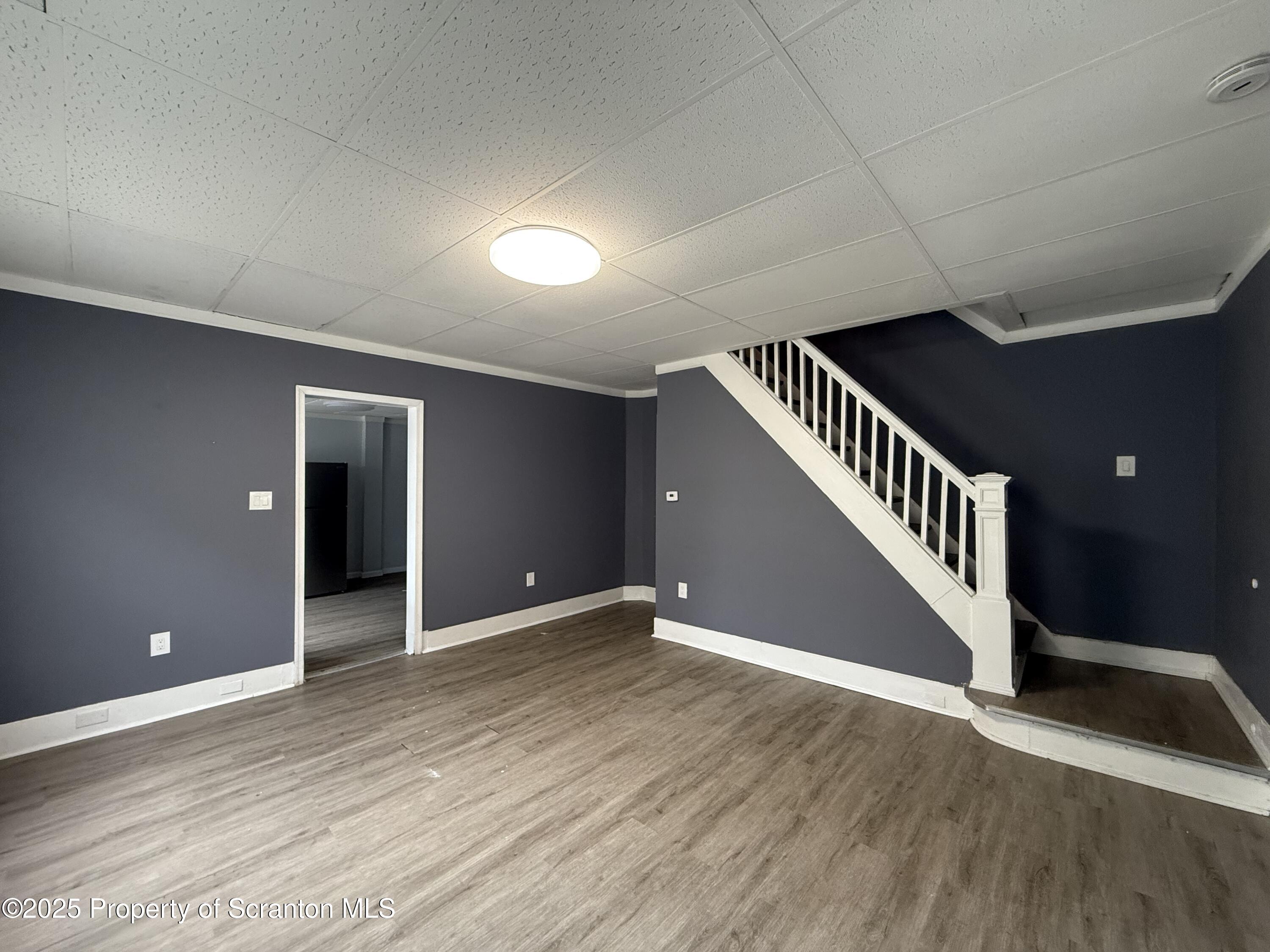 203 Greenbush Street Scranton, PA 18508 - Photo 3 of 20 a view of an entryway with wooden floor