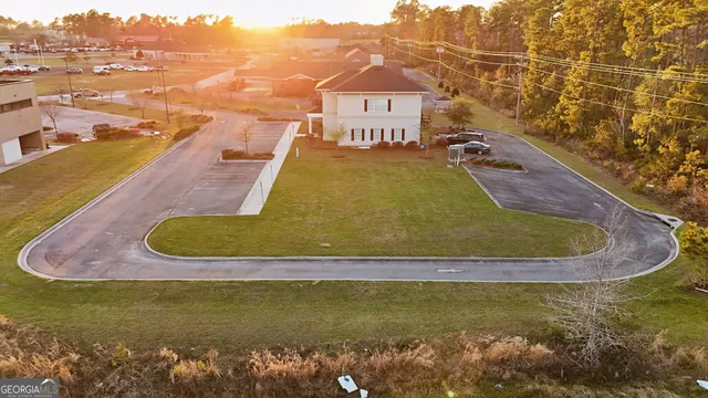 a view of a swimming pool with an outdoor space