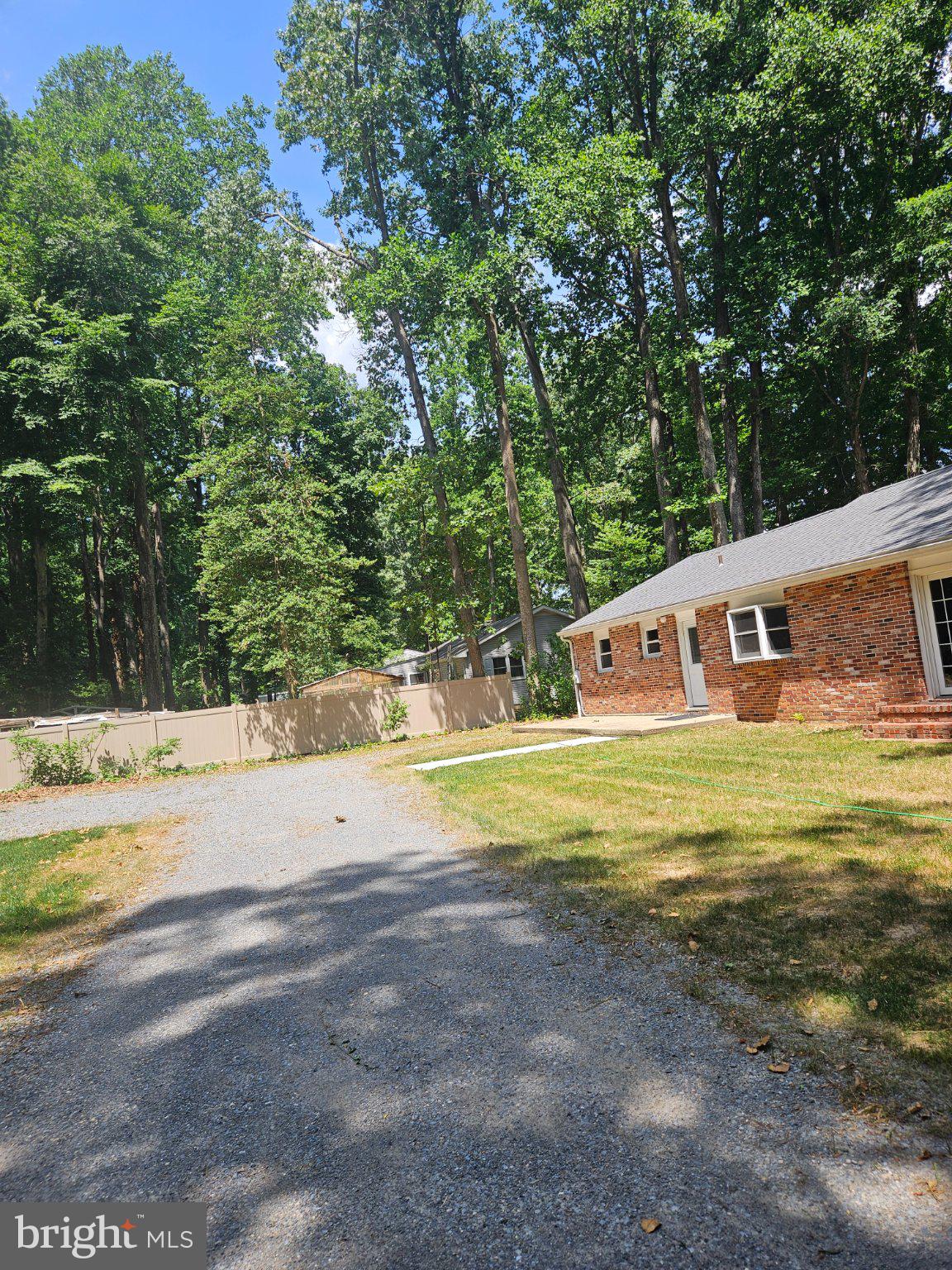 3250 Andrews Lake Road Felton, DE 19943 - Photo 49 of 50 Serene home nestled among tall trees.