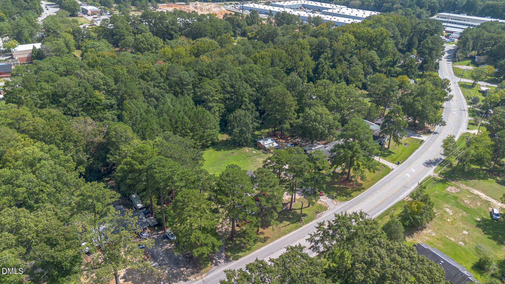 655-659 Sunnybrook Road Raleigh, NC 27610 - Photo 12 of 14 a view of a garden with a pathway