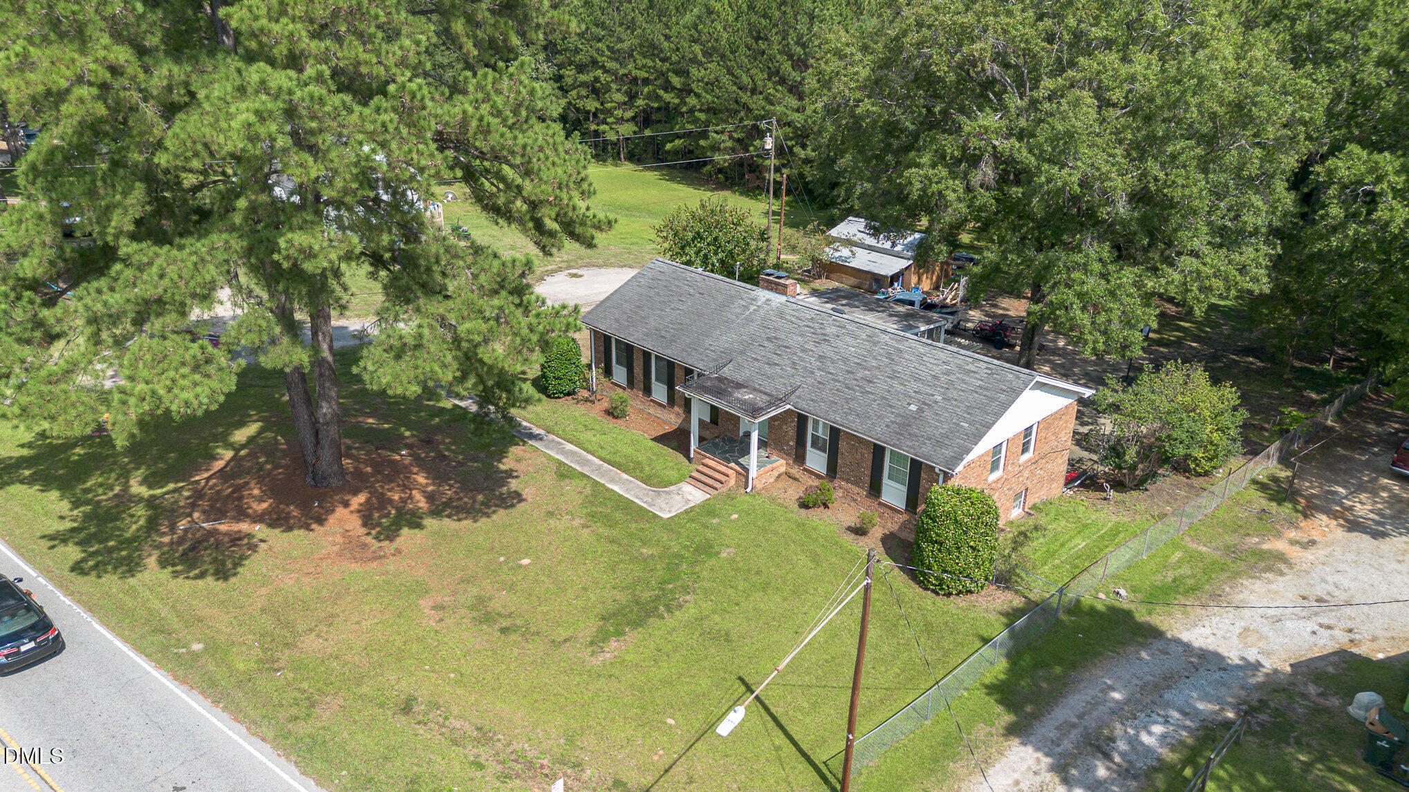 655-659 Sunnybrook Road Raleigh, NC 27610 - Photo 7 of 14 a view of a house with a yard