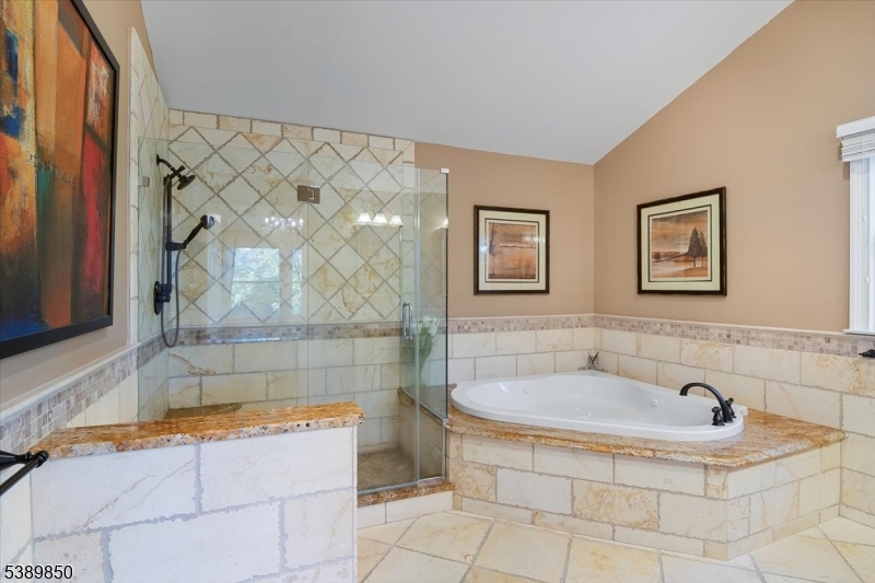 68 Horseneck Road Montville, NJ 07045 - Photo 16 of 34 a bathroom with a sink and a shower