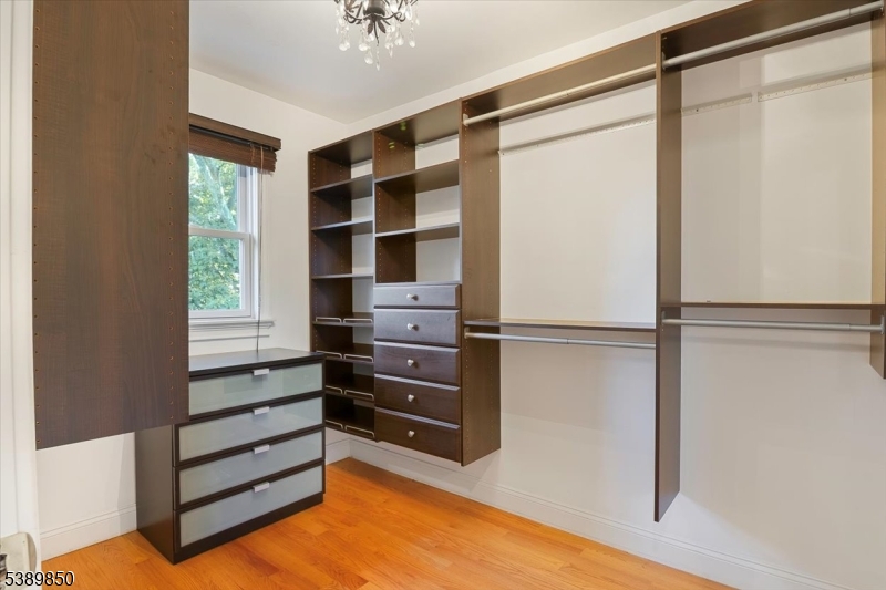 68 Horseneck Road Montville, NJ 07045 - Photo 18 of 34 a view of walk in closet with empty racks