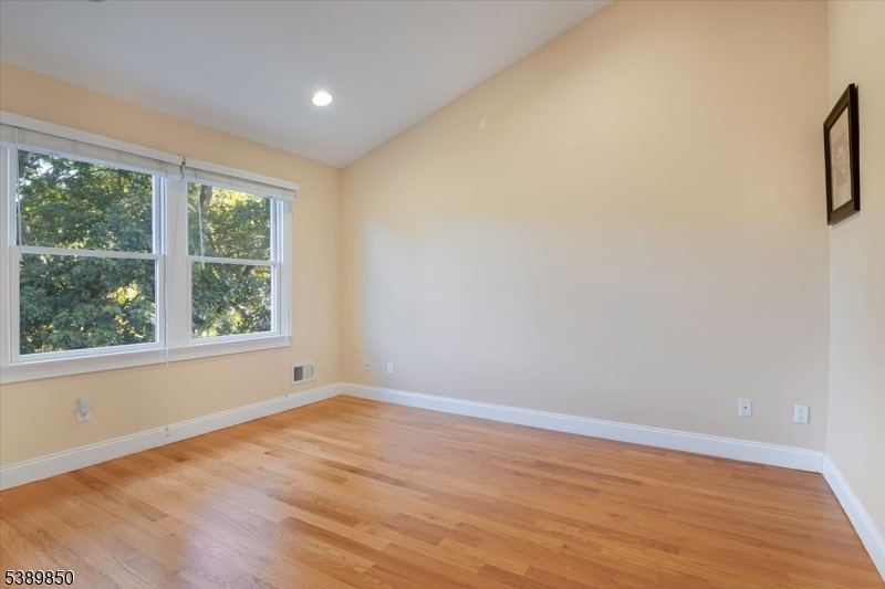 68 Horseneck Road Montville, NJ 07045 - Photo 20 of 34 wooden floor in an empty room with a window
