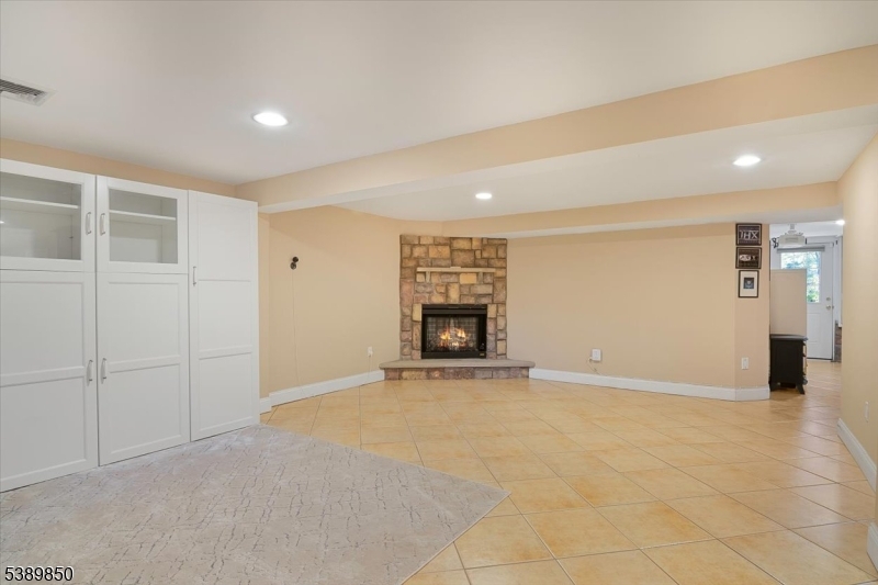 68 Horseneck Road Montville, NJ 07045 - Photo 22 of 34 a view of an empty room with a fireplace