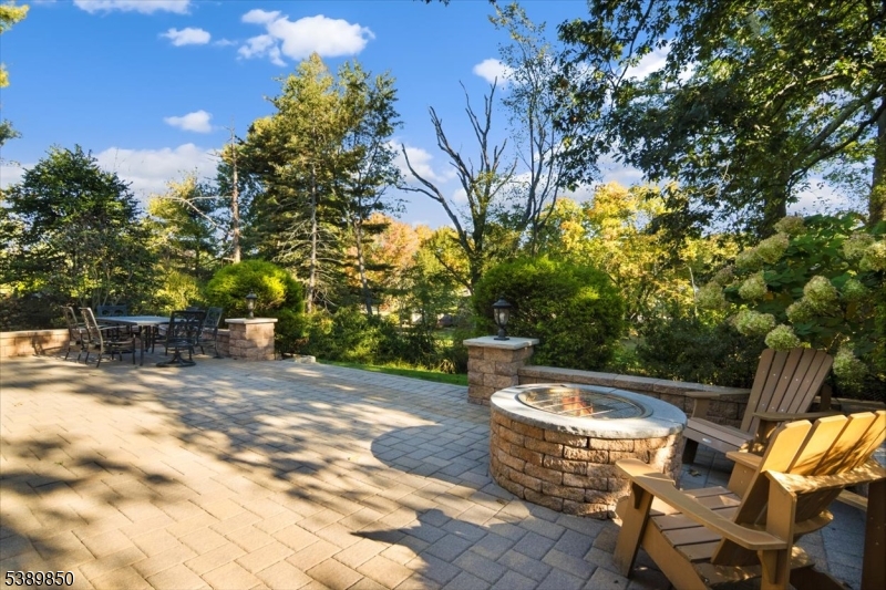 68 Horseneck Road Montville, NJ 07045 - Photo 26 of 34 a view of a backyard with sitting area