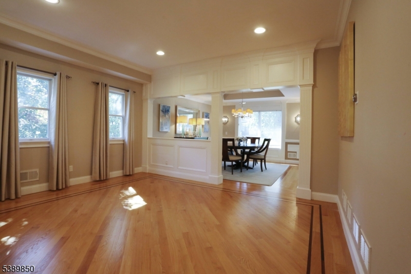 68 Horseneck Road Montville, NJ 07045 - Photo 8 of 34 a view of empty room with wooden floor and dining table