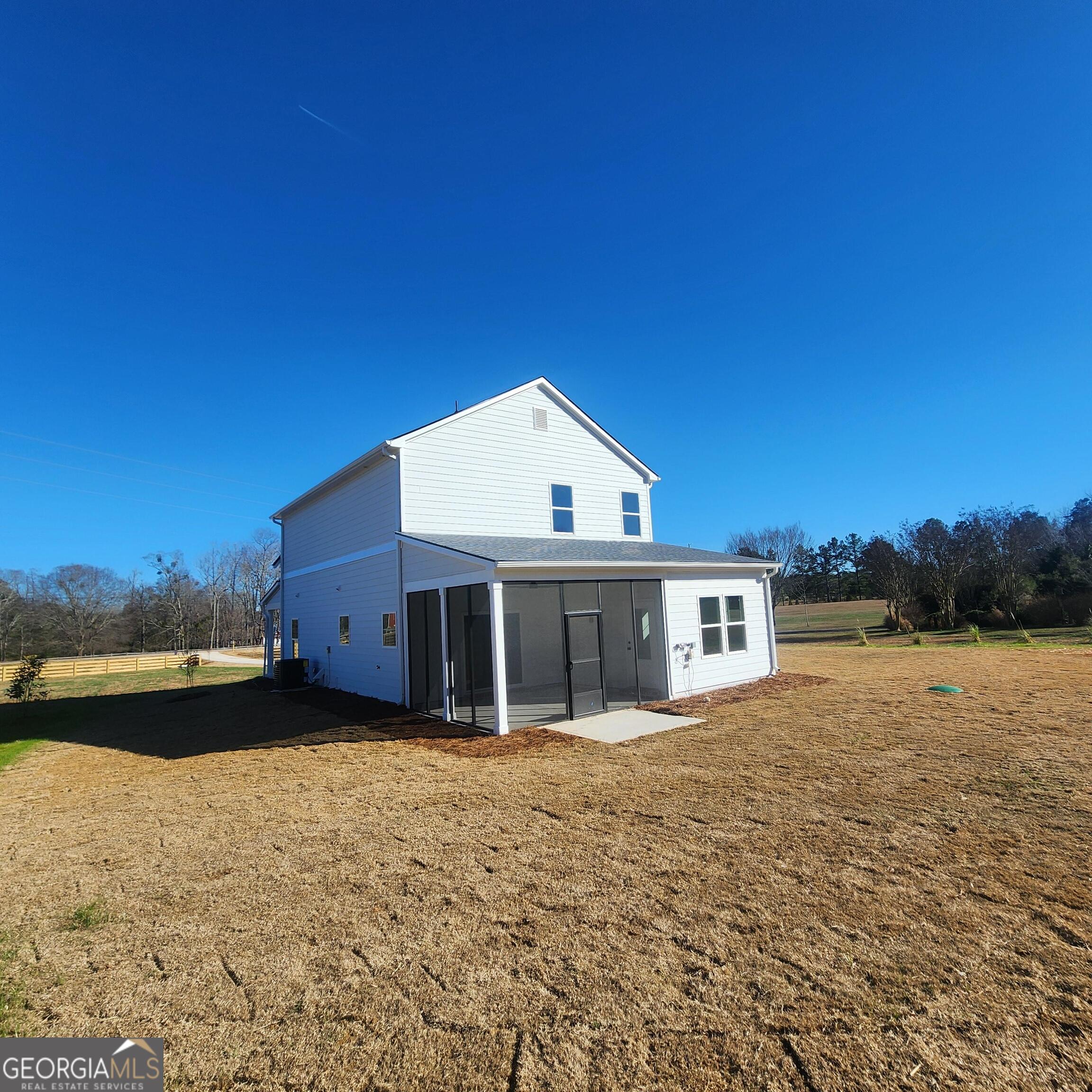 431 North Unity Grove Road Locust Grove, GA 30248 - Photo 3 of 18 a front view of a house with a yard