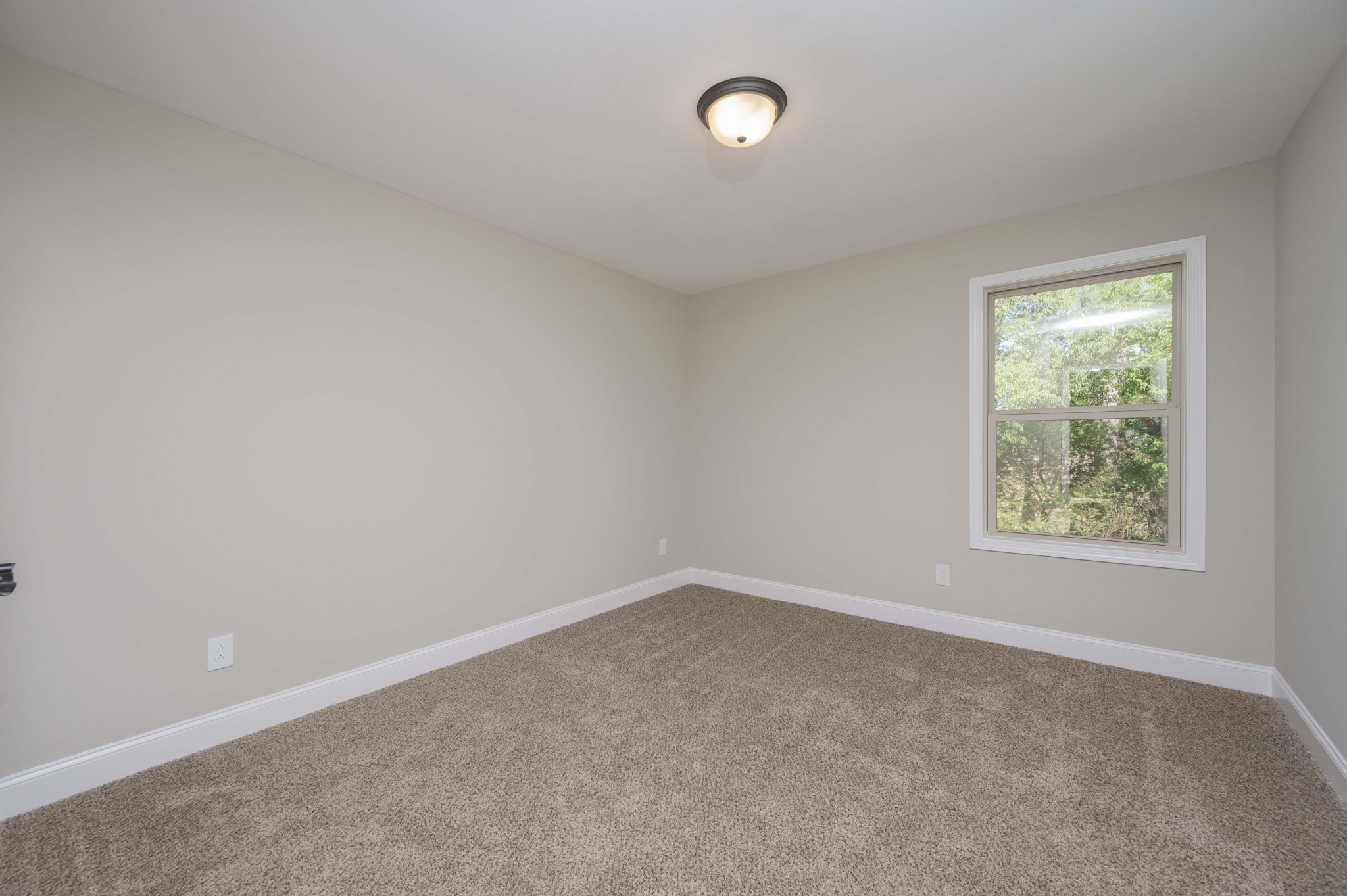 283 Providence Road Pelham, TN 37366 - Photo 18 of 24 an empty room with a window