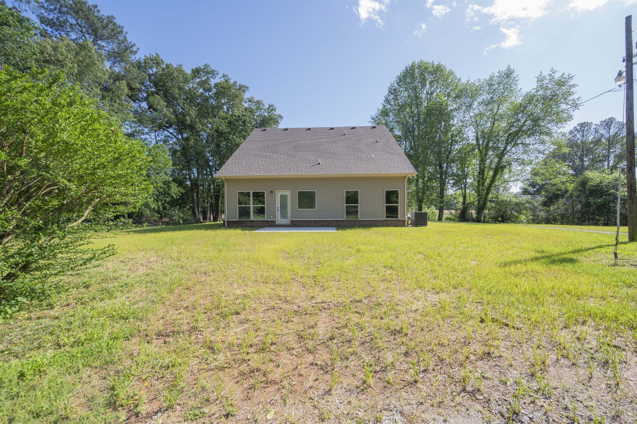 283 Providence Road Pelham, TN 37366 - Photo 23 of 24 a house with swimming pool in front of it
