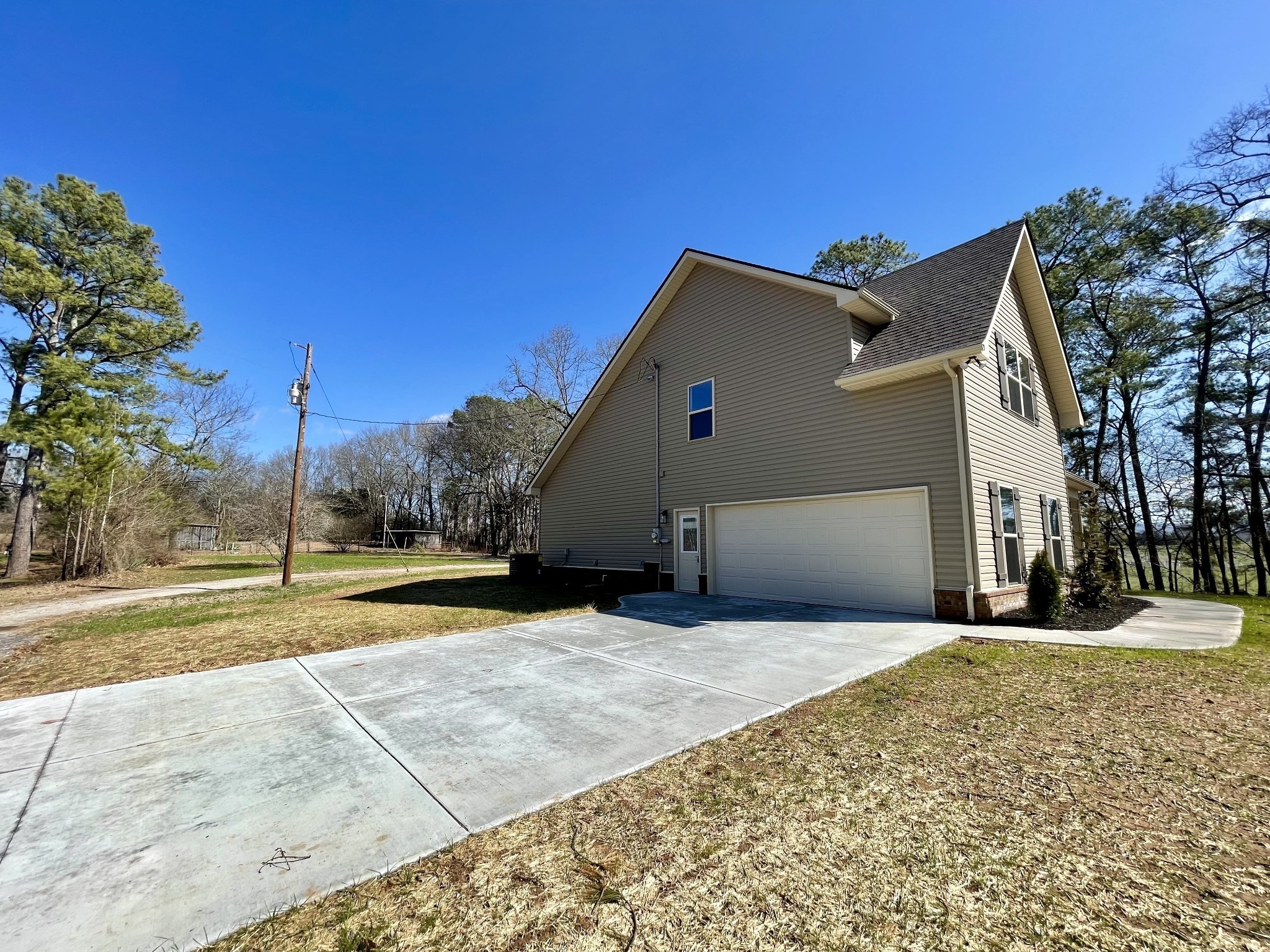 283 Providence Road Pelham, TN 37366 - Photo 24 of 24 a view of a house with a yard