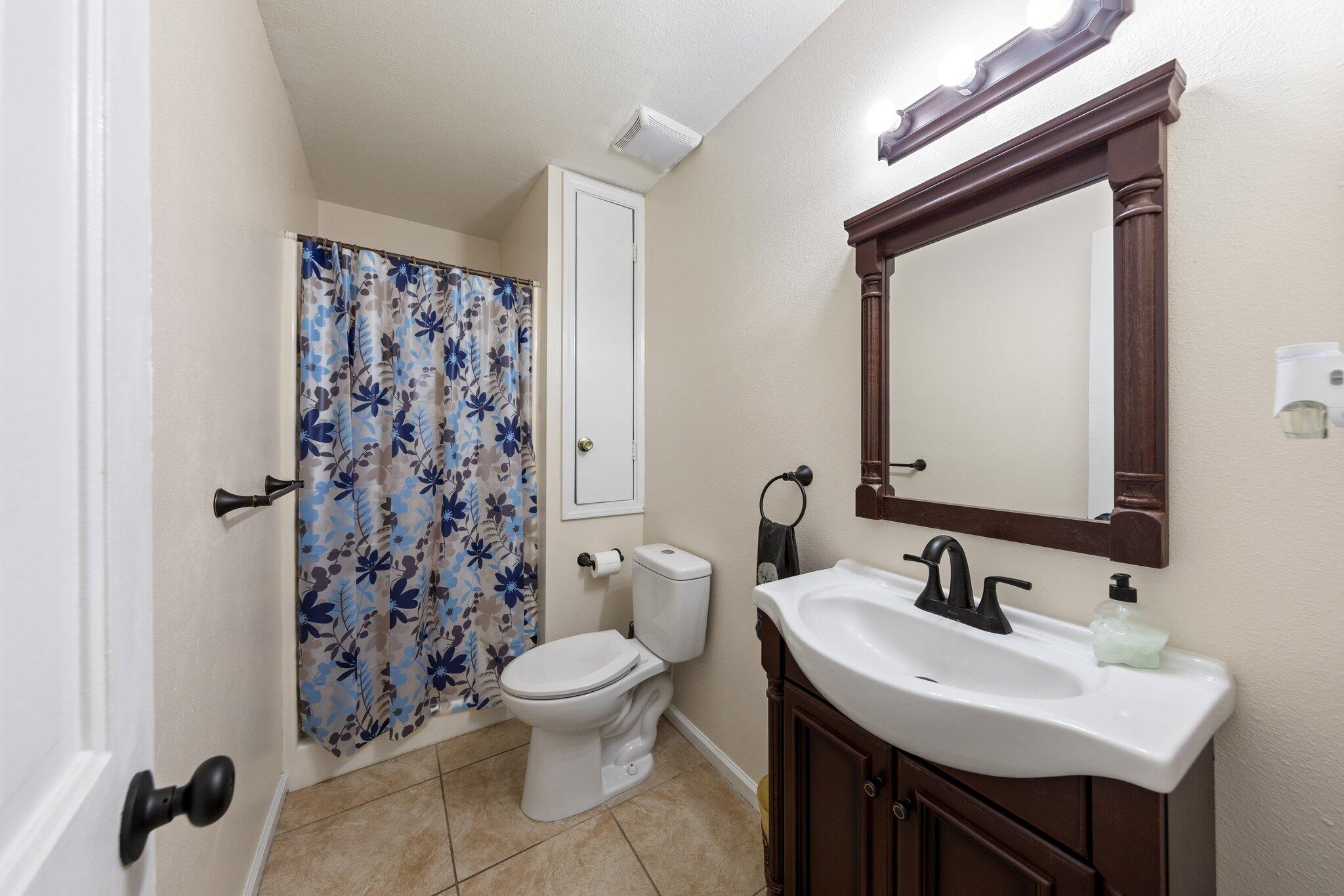 114 4th Avenue Shalimar, FL 32579 - Photo 11 of 59 a bathroom with a sink toilet and shower