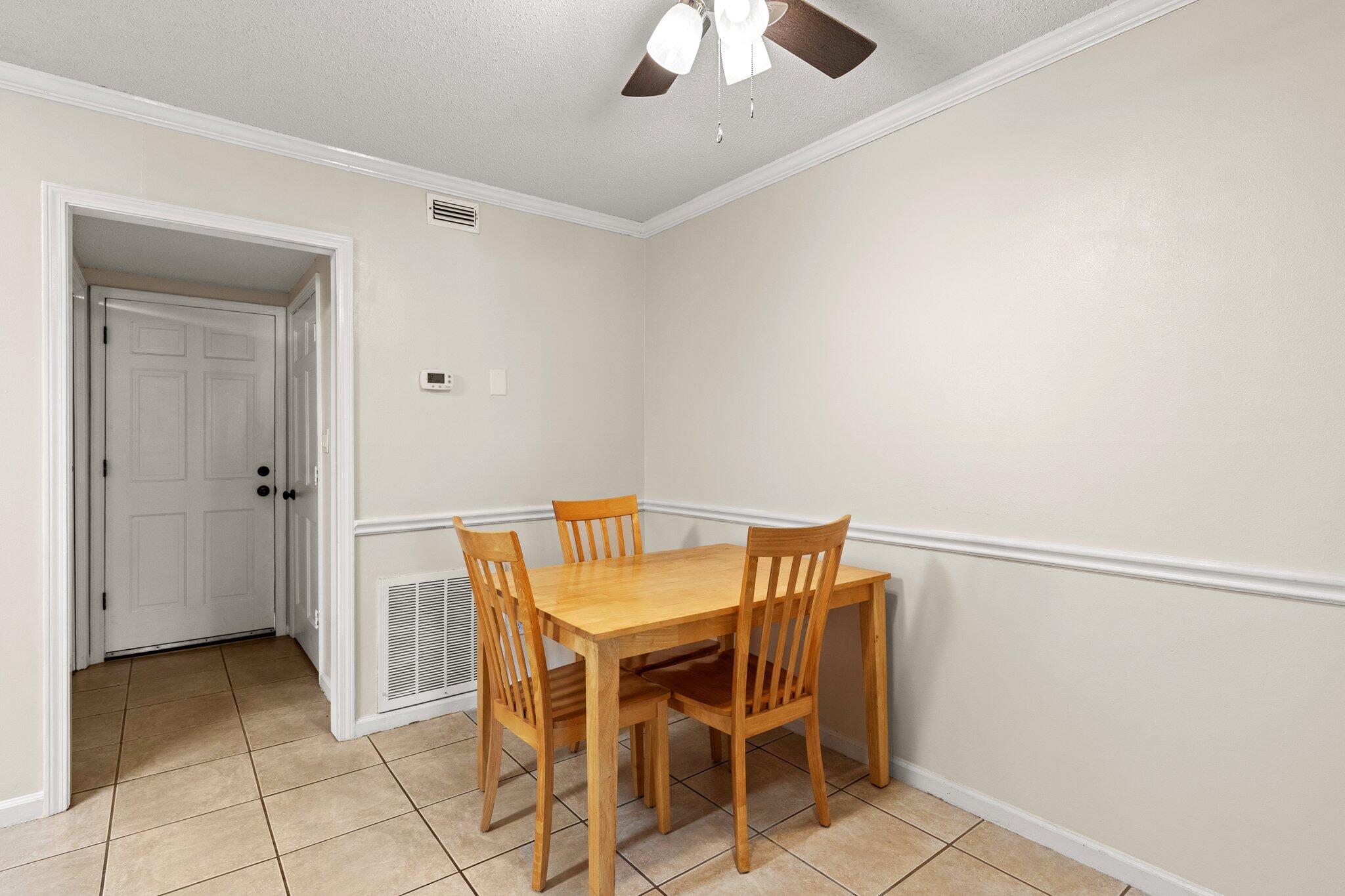 114 4th Avenue Shalimar, FL 32579 - Photo 12 of 59 a view of a livingroom with furniture and chandelier fan