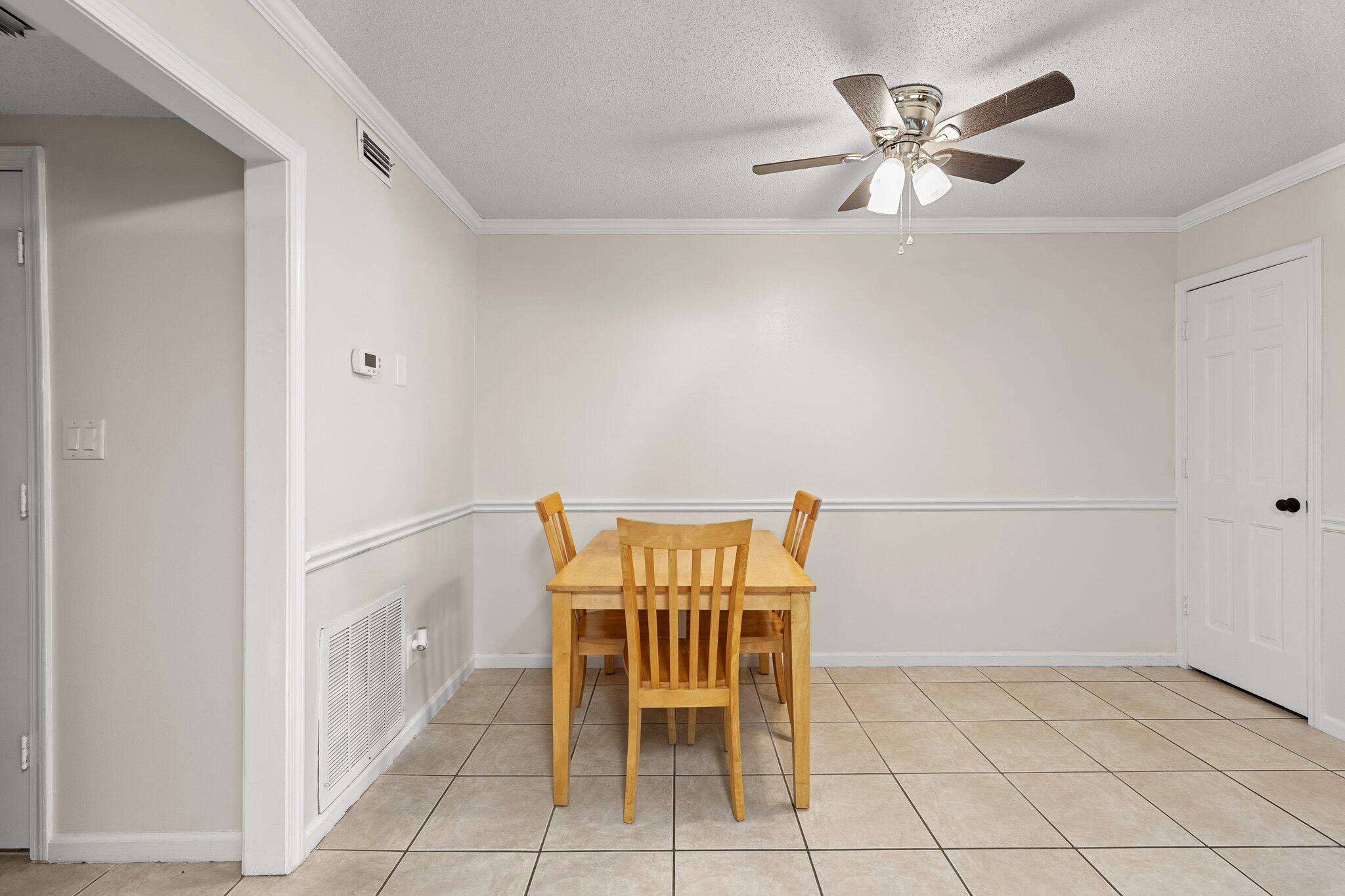 114 4th Avenue Shalimar, FL 32579 - Photo 14 of 59 a view of a dining room with furniture