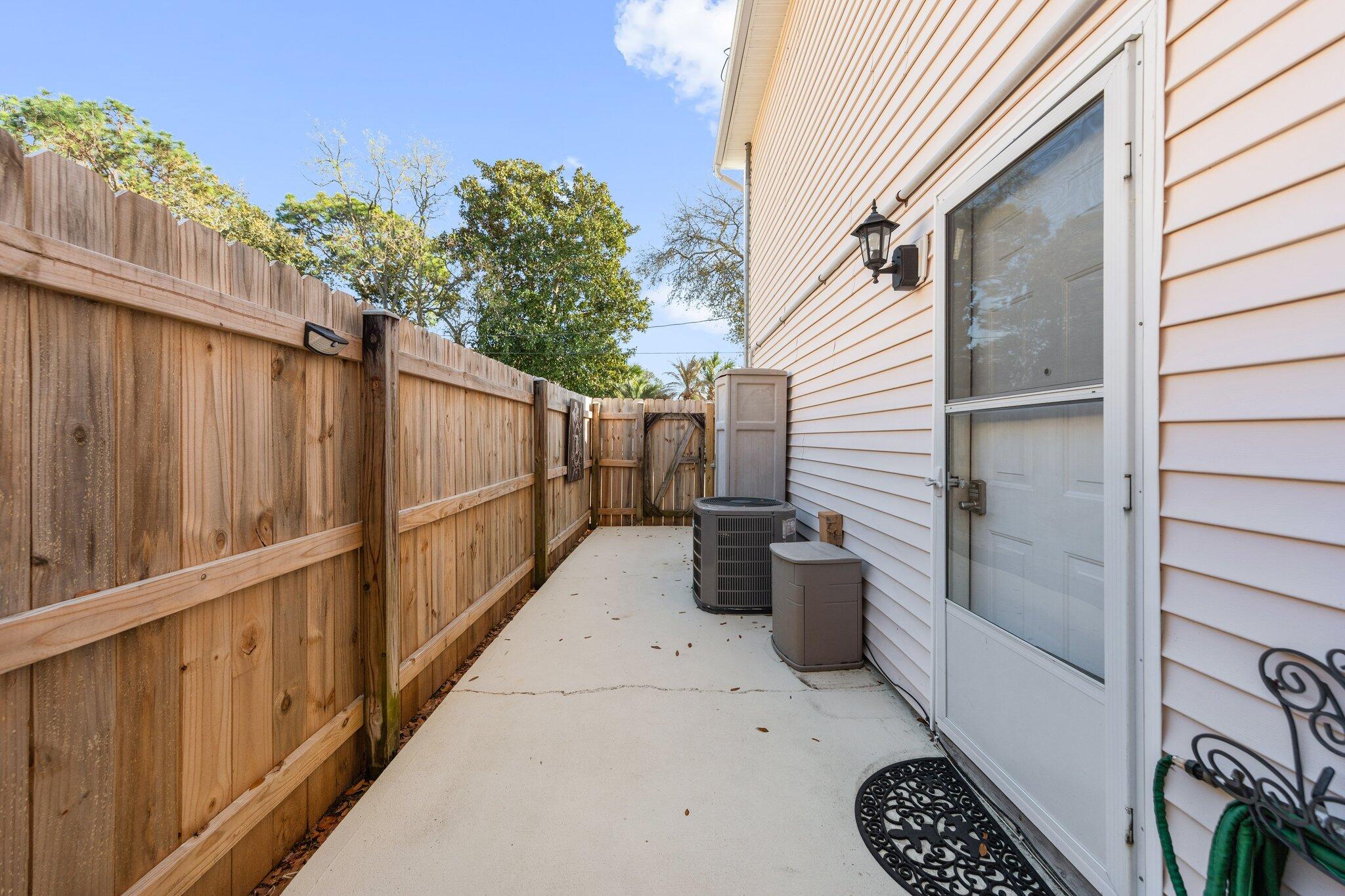 114 4th Avenue Shalimar, FL 32579 - Photo 23 of 59 a view of a back yard of the house