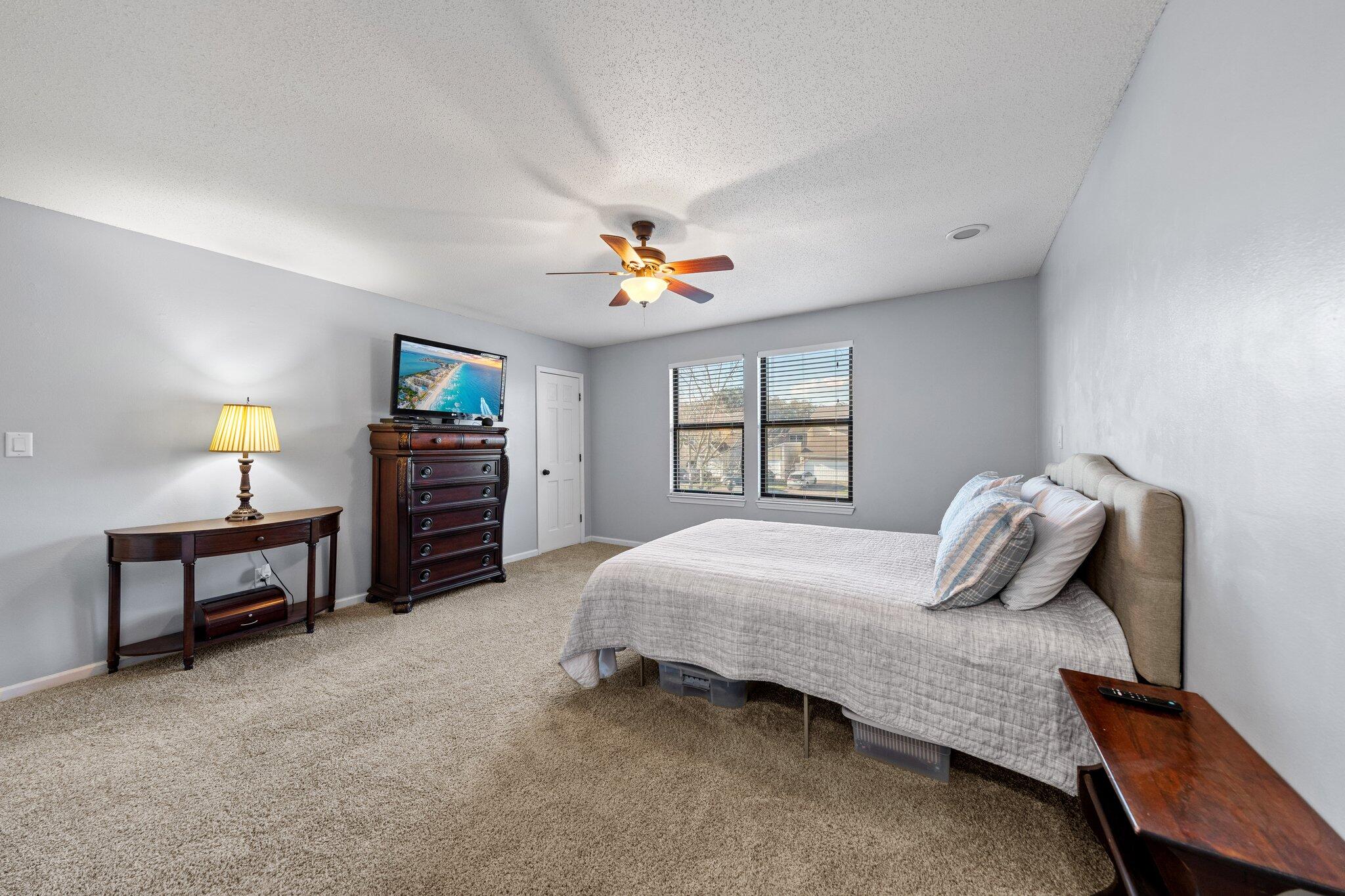 114 4th Avenue Shalimar, FL 32579 - Photo 31 of 59 a bedroom with a bed and a window