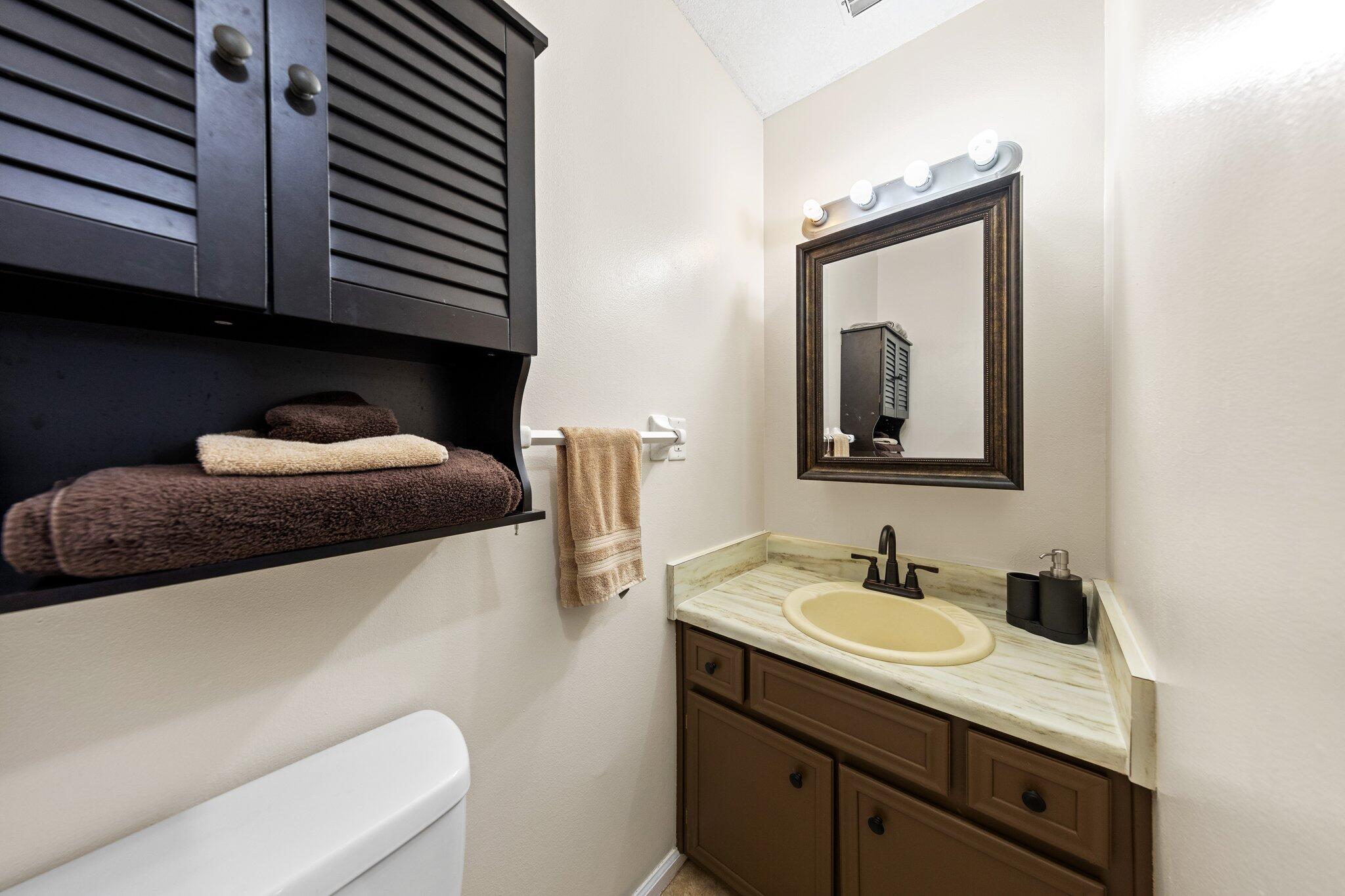 114 4th Avenue Shalimar, FL 32579 - Photo 33 of 59 a en suite bathroom with a sink and a mirror