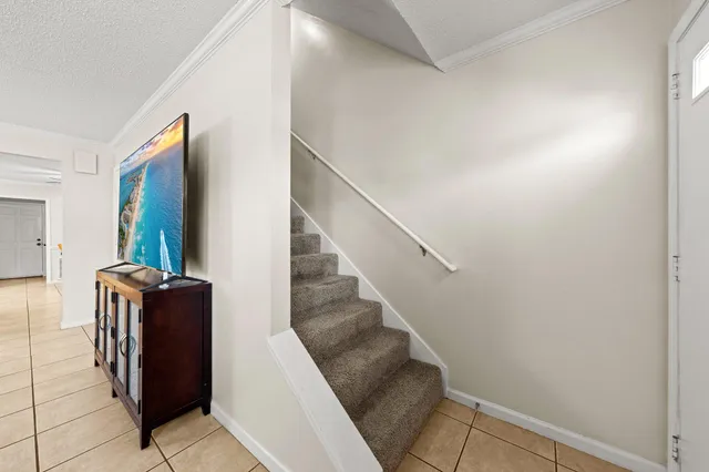 a view of entryway with stairs