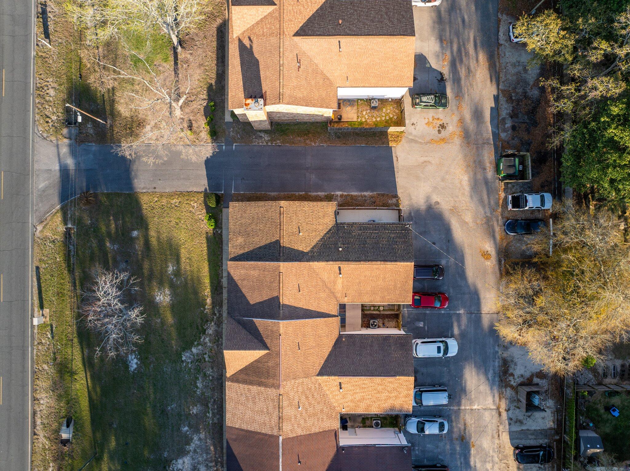 114 4th Avenue Shalimar, FL 32579 - Photo 58 of 59 an aerial view of residential houses with outdoor space