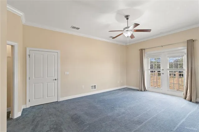 a bathroom with a granite countertop sink a toilet and a bathtub
