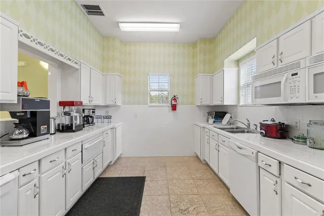 a view of a building with a tree