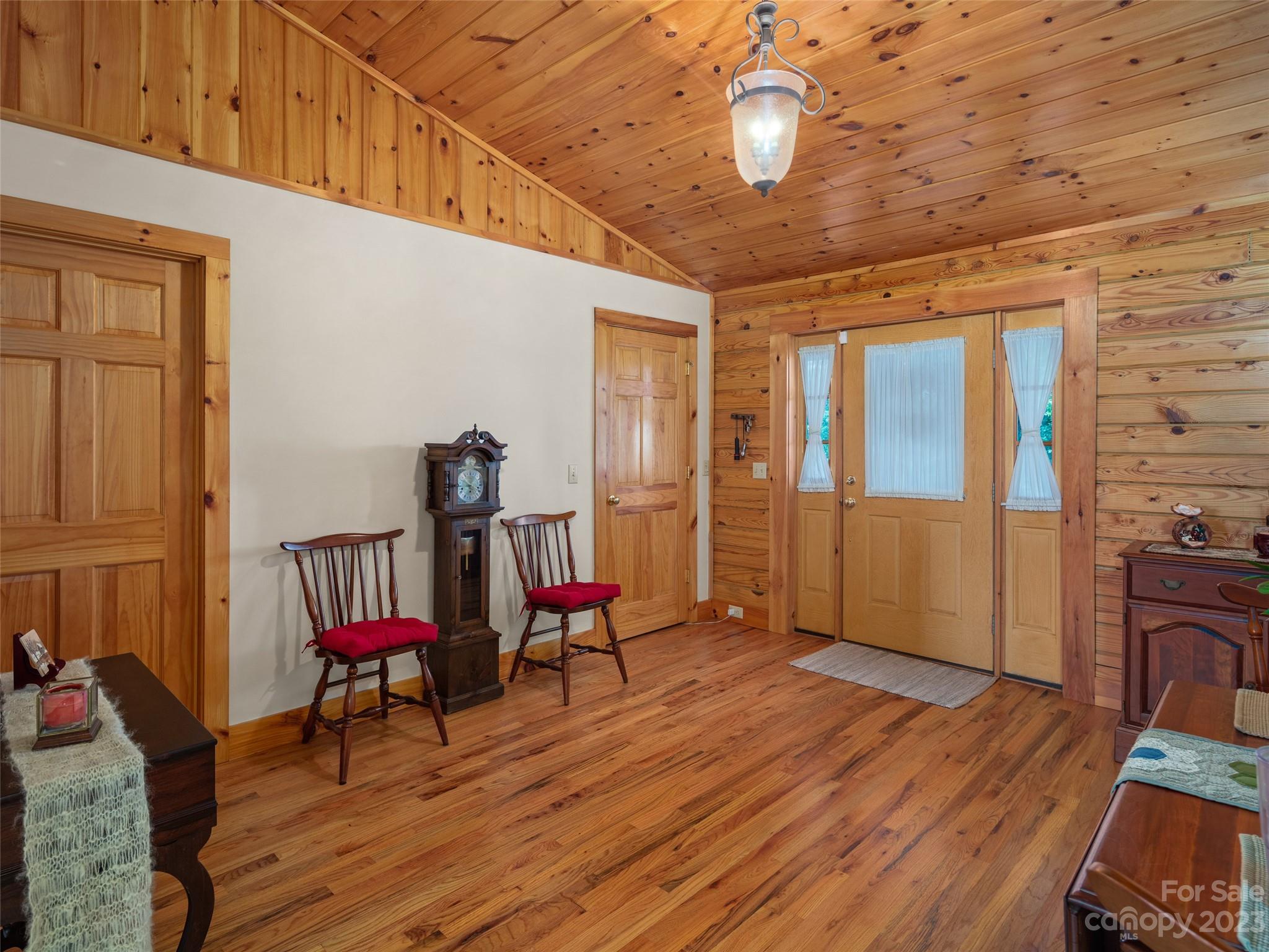 201 Staton Ridge Road Saluda, NC 28773 - Photo 8 of 32 a view of a livingroom with furniture wooden floor and windows