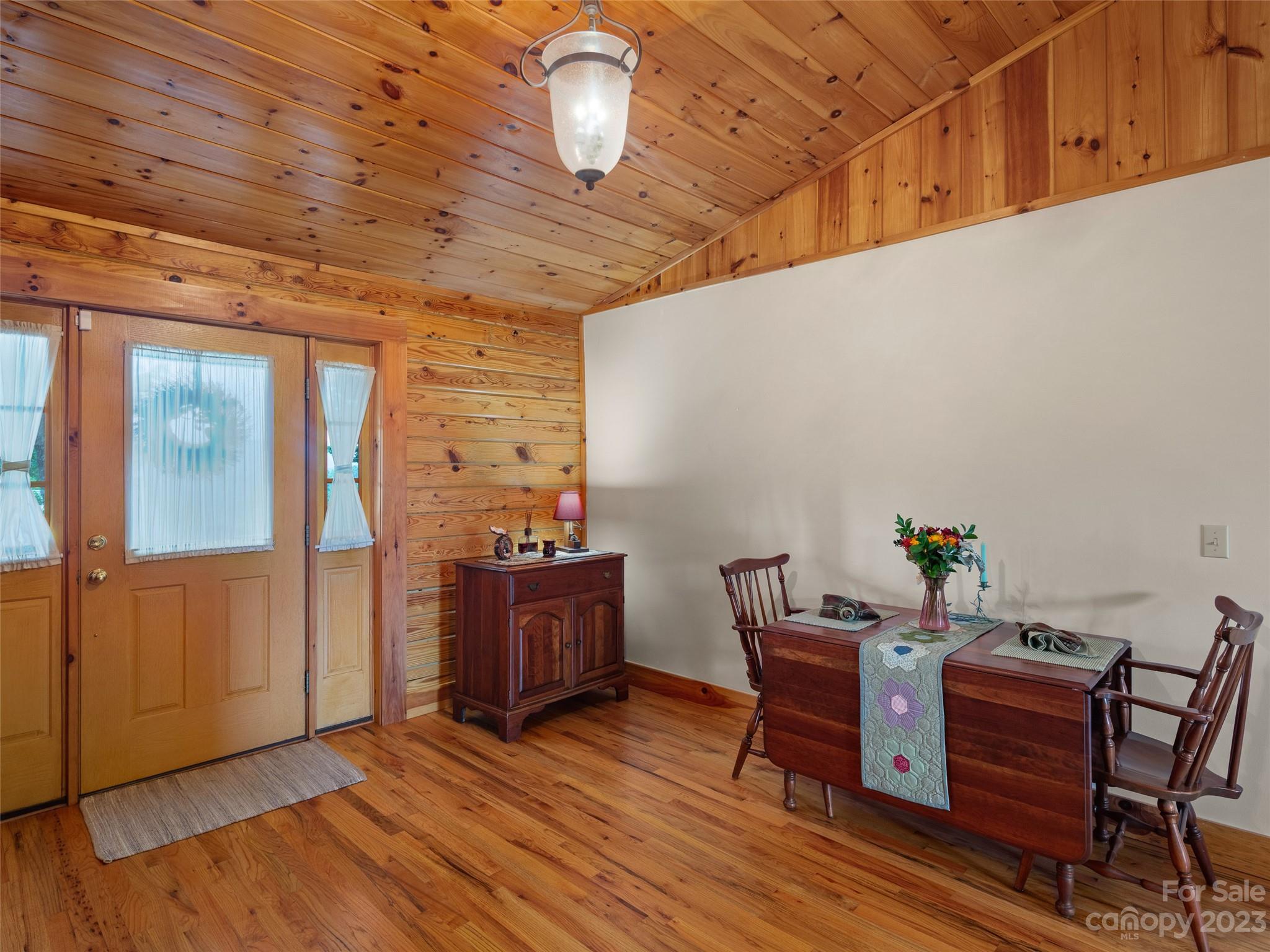 201 Staton Ridge Road Saluda, NC 28773 - Photo 10 of 32 a view of a livingroom with furniture and wooden floor