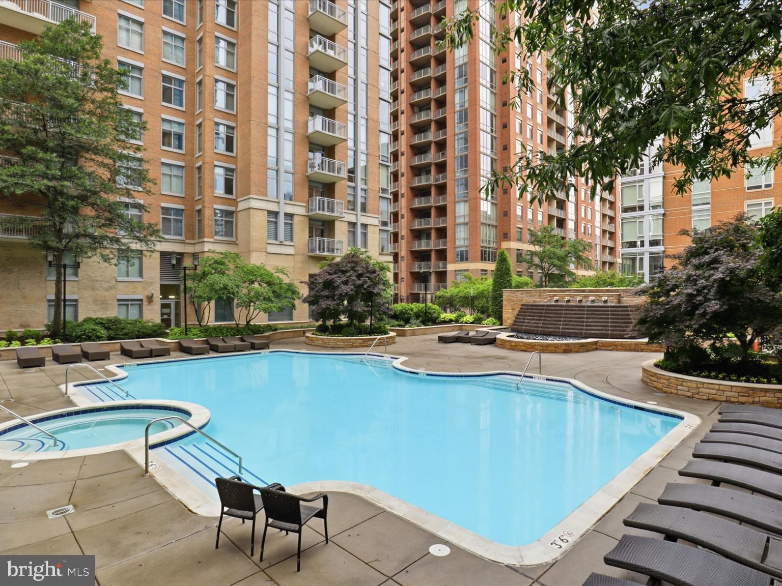 11990 Market Street, Unit 216 Reston, VA 20190 - Photo 35 of 41 Serene poolside retreat in the city.