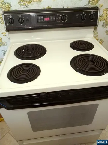a close view of a stove a microwave and a stove