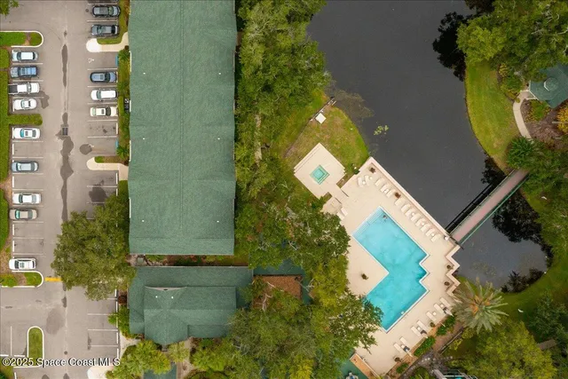 an aerial view of a house with a garden