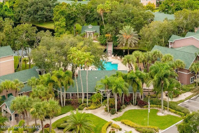 a garden view with a fountain