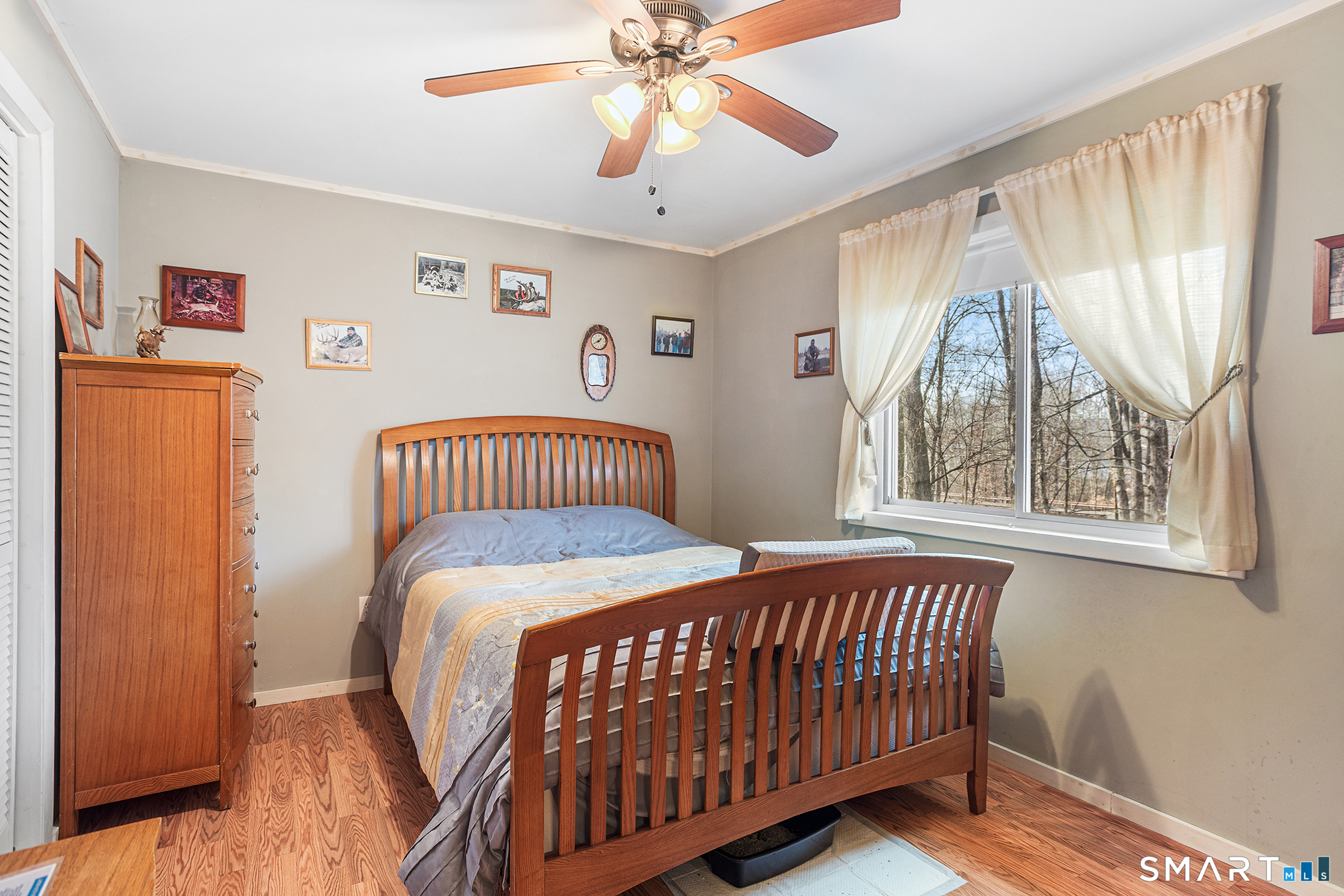 600 Woodtick Road Wolcott, CT 06716 - Photo 12 of 28 a bedroom with a bed and a window