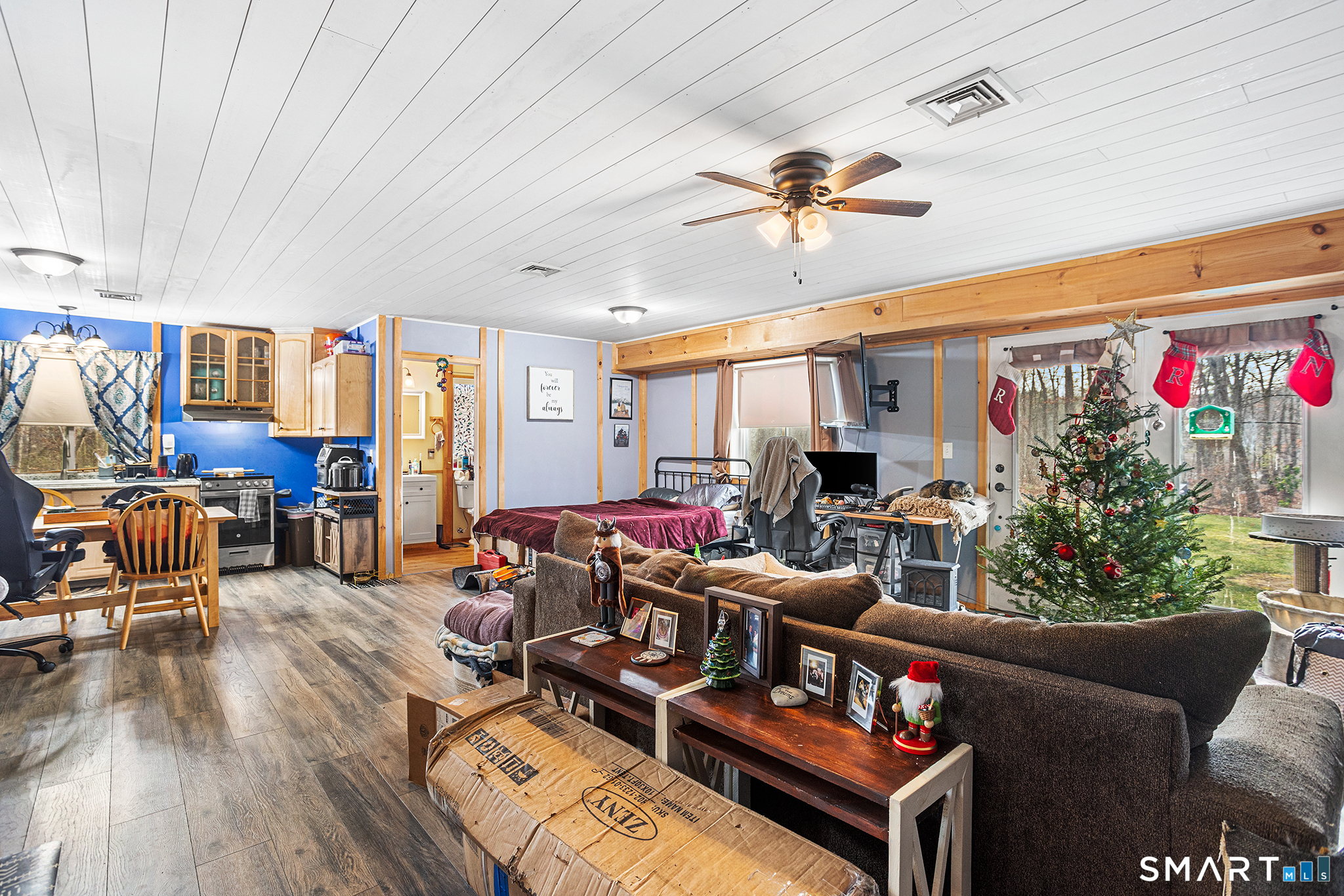 600 Woodtick Road Wolcott, CT 06716 - Photo 17 of 28 a living room with furniture and wooden floor