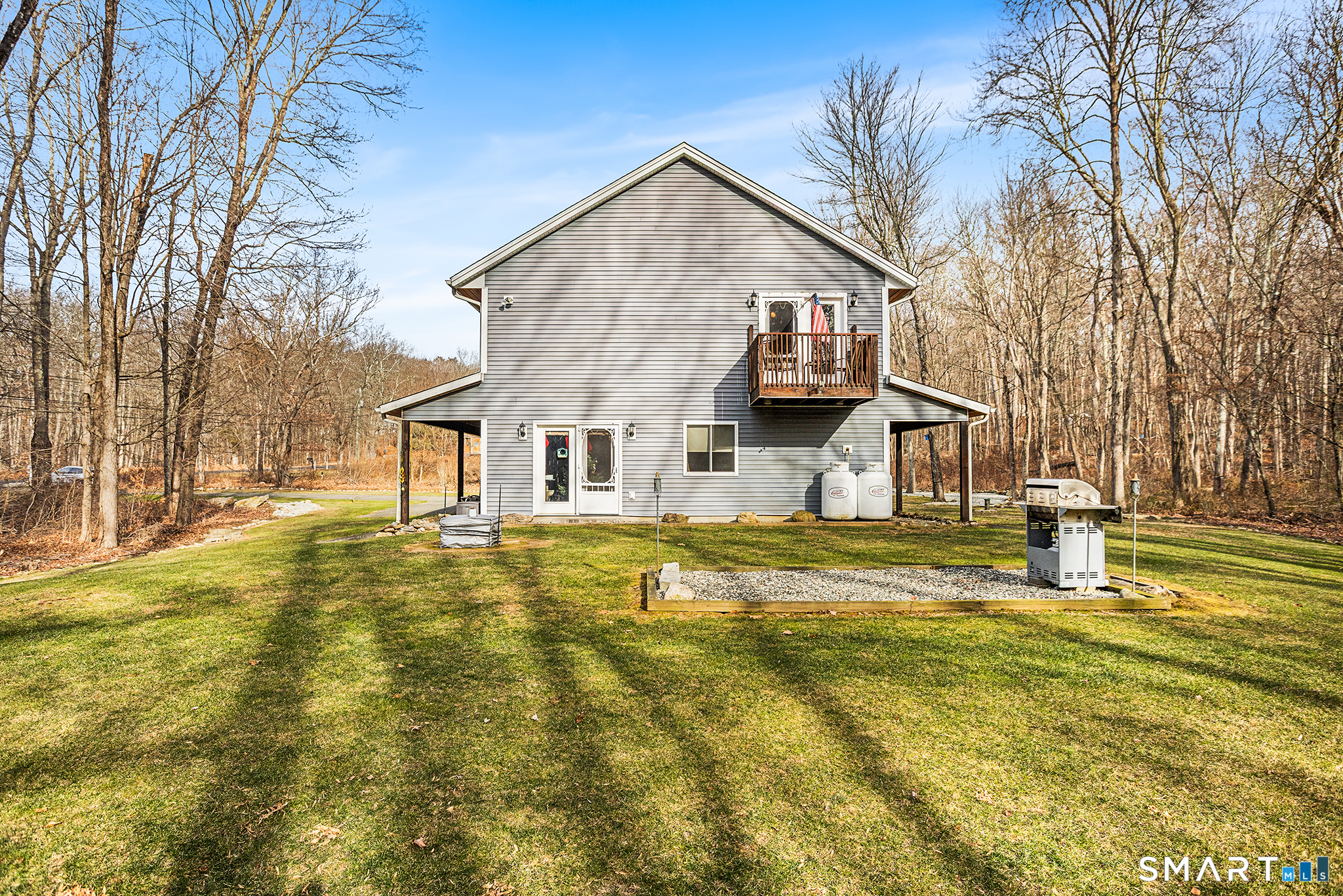 600 Woodtick Road Wolcott, CT 06716 - Photo 21 of 28 a view of a house with a yard covered with snow
