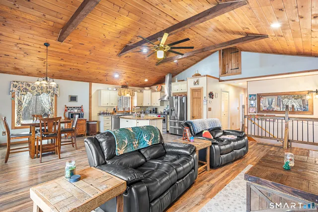 a kitchen with sink a stove and cabinets