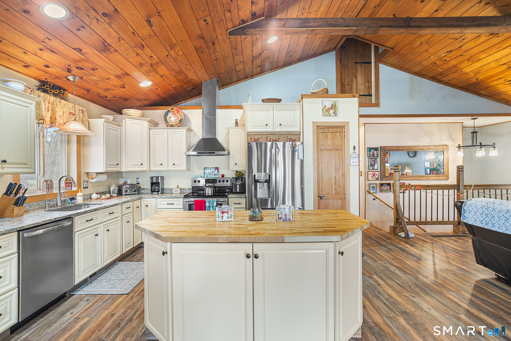600 Woodtick Road Wolcott, CT 06716 - Photo 5 of 28 a kitchen with sink a stove and cabinets