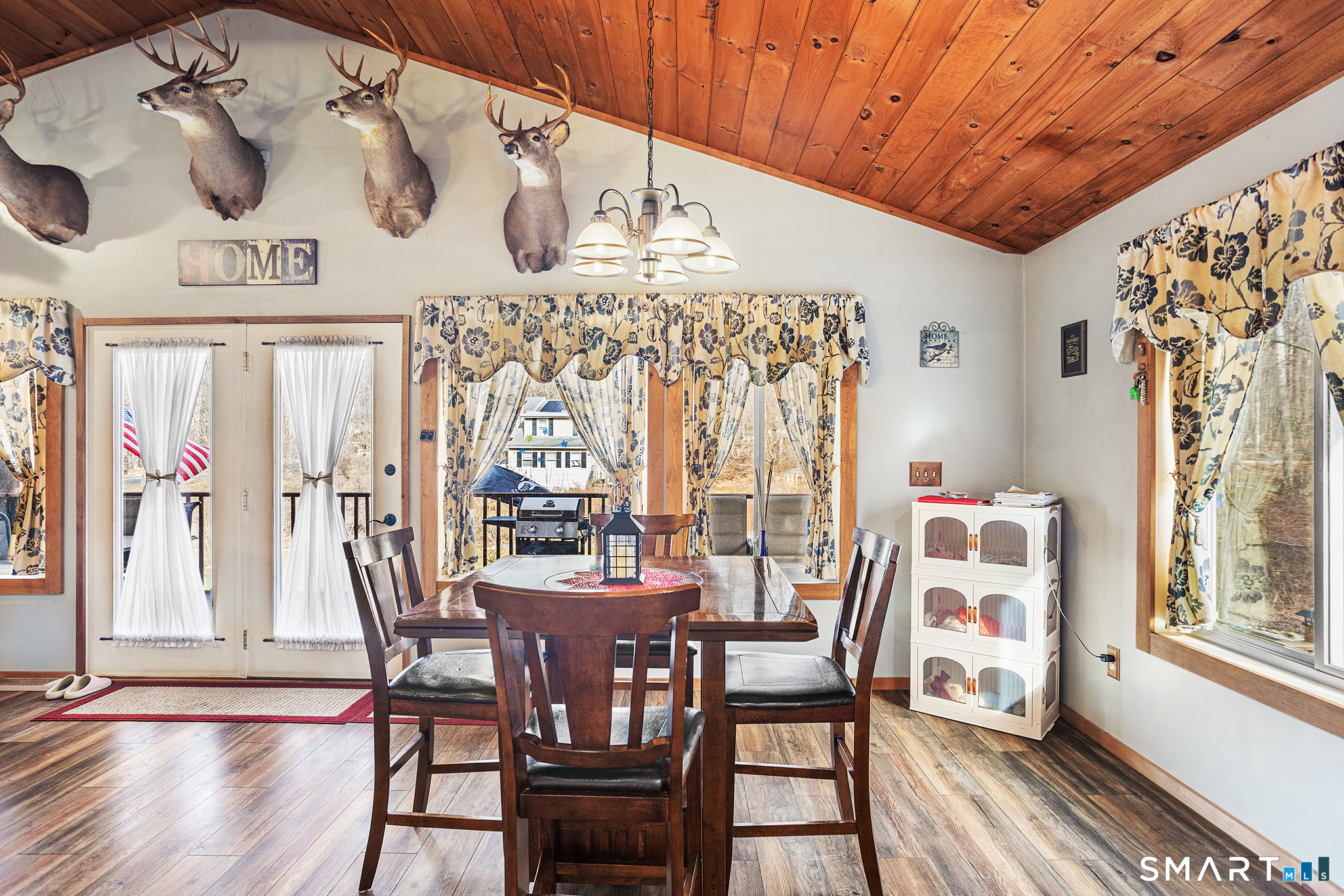 600 Woodtick Road Wolcott, CT 06716 - Photo 8 of 28 a view of a dining room with furniture window and wooden floor
