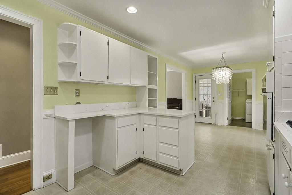 2524 Asbury Court Decatur, GA 30033 - Photo 12 of 26 a kitchen with cabinets and window