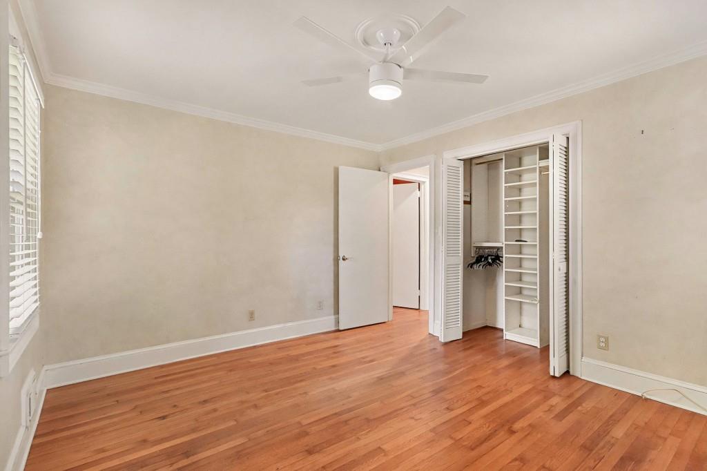 2524 Asbury Court Decatur, GA 30033 - Photo 21 of 26 an empty room with wooden floor and window