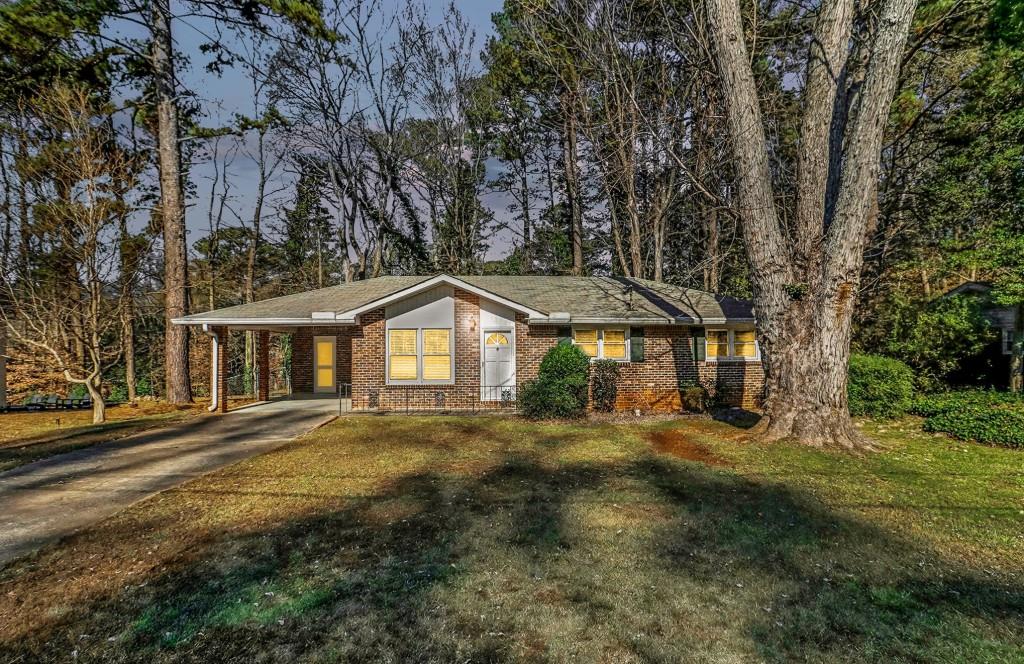 2524 Asbury Court Decatur, GA 30033 - Photo 26 of 26 a front view of a house with a yard
