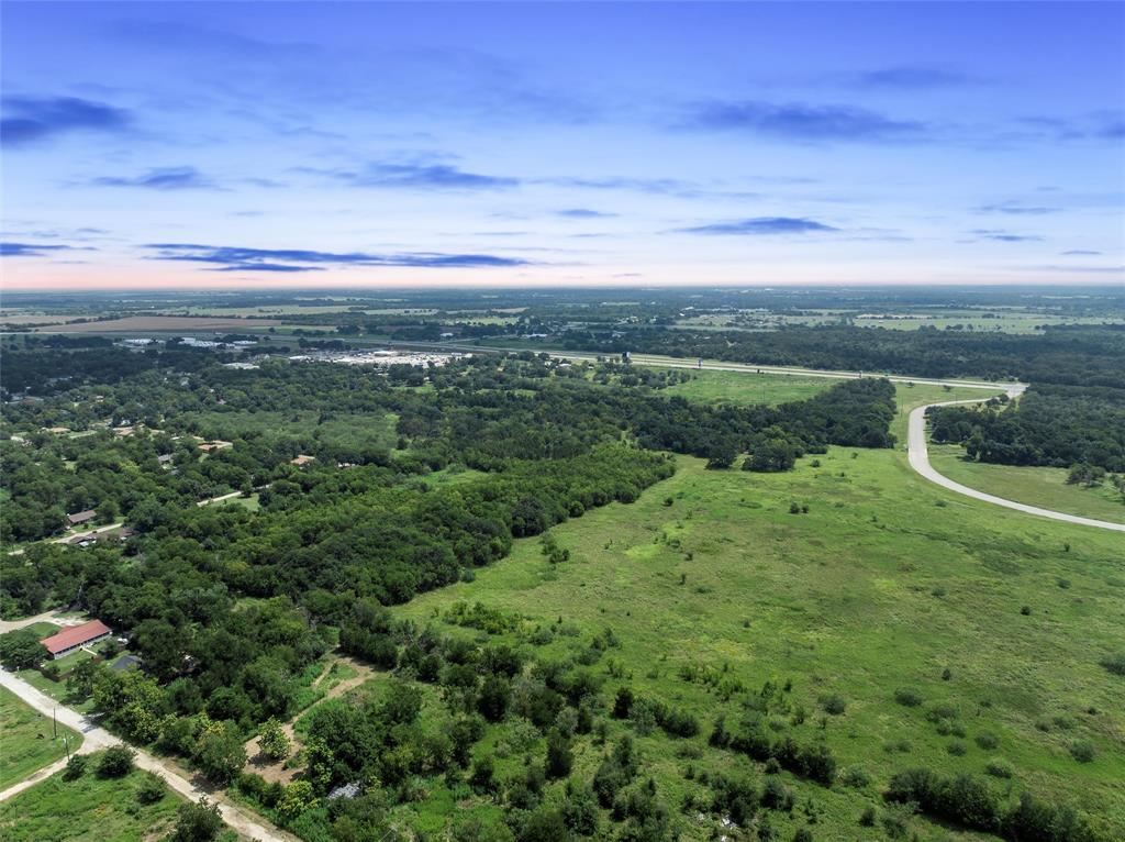 Tbd Phillip Street Marlin, TX 76661 - Photo 14 of 18 a view of a green field with lots of bushes